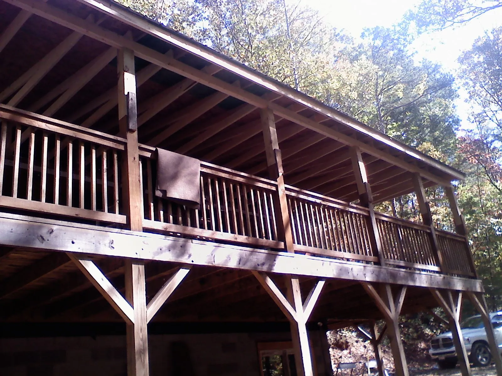 Timber framing under a new elevated porch and deck — Roof Leak Repair in Williston by Roofing Brothers